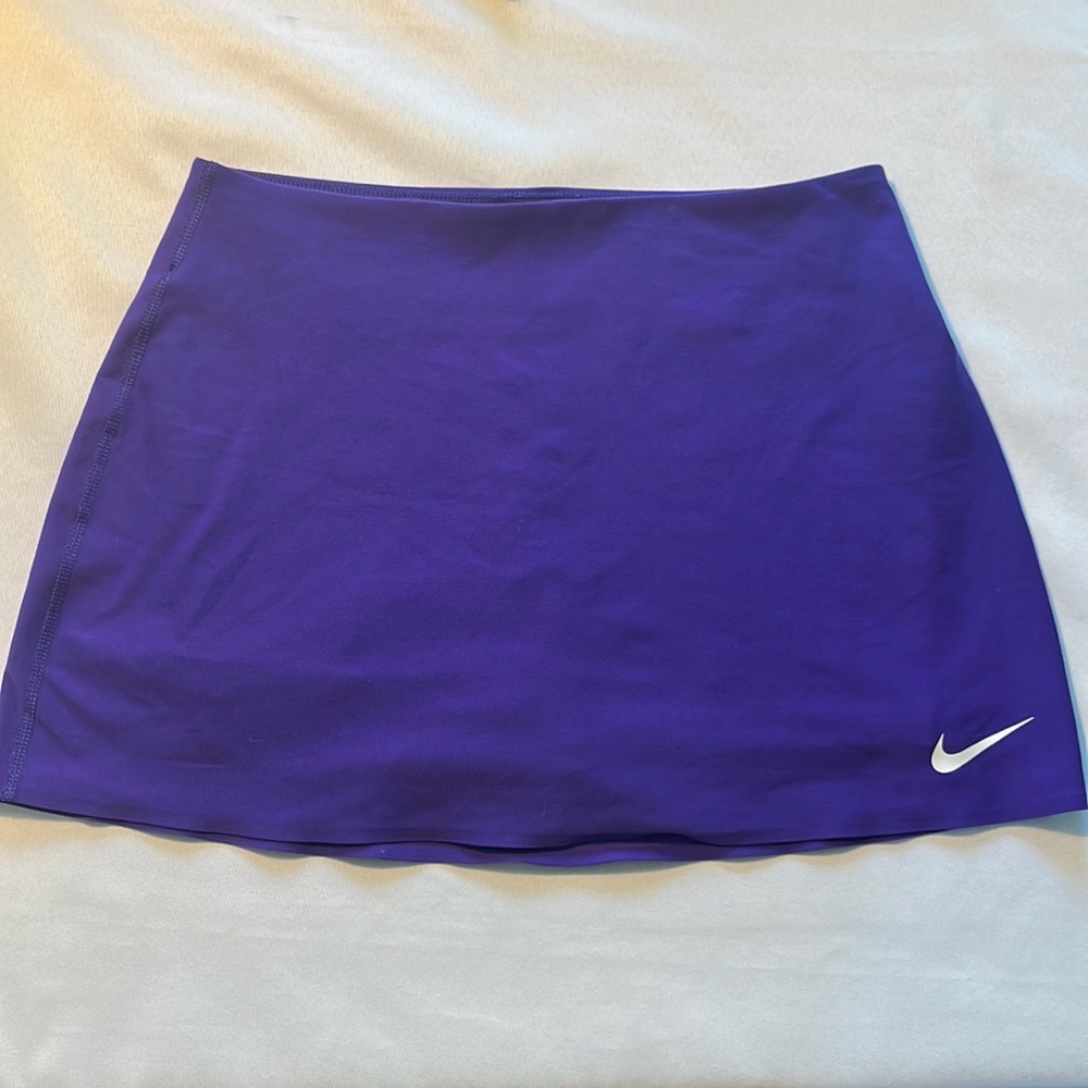 Purple Nike size small tennis skirt.